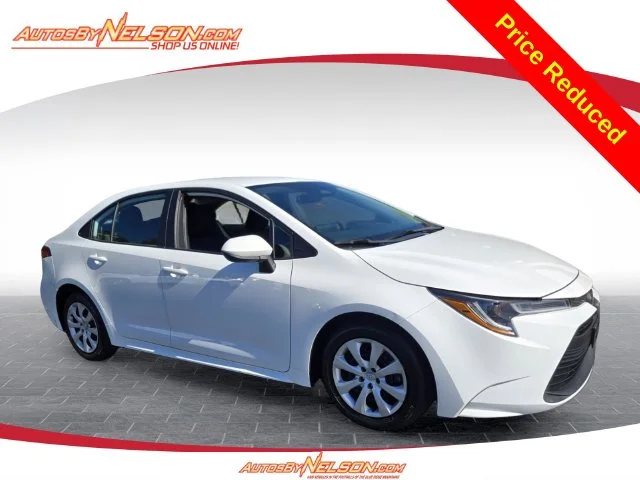 Used 2023 White Toyota LE image 1