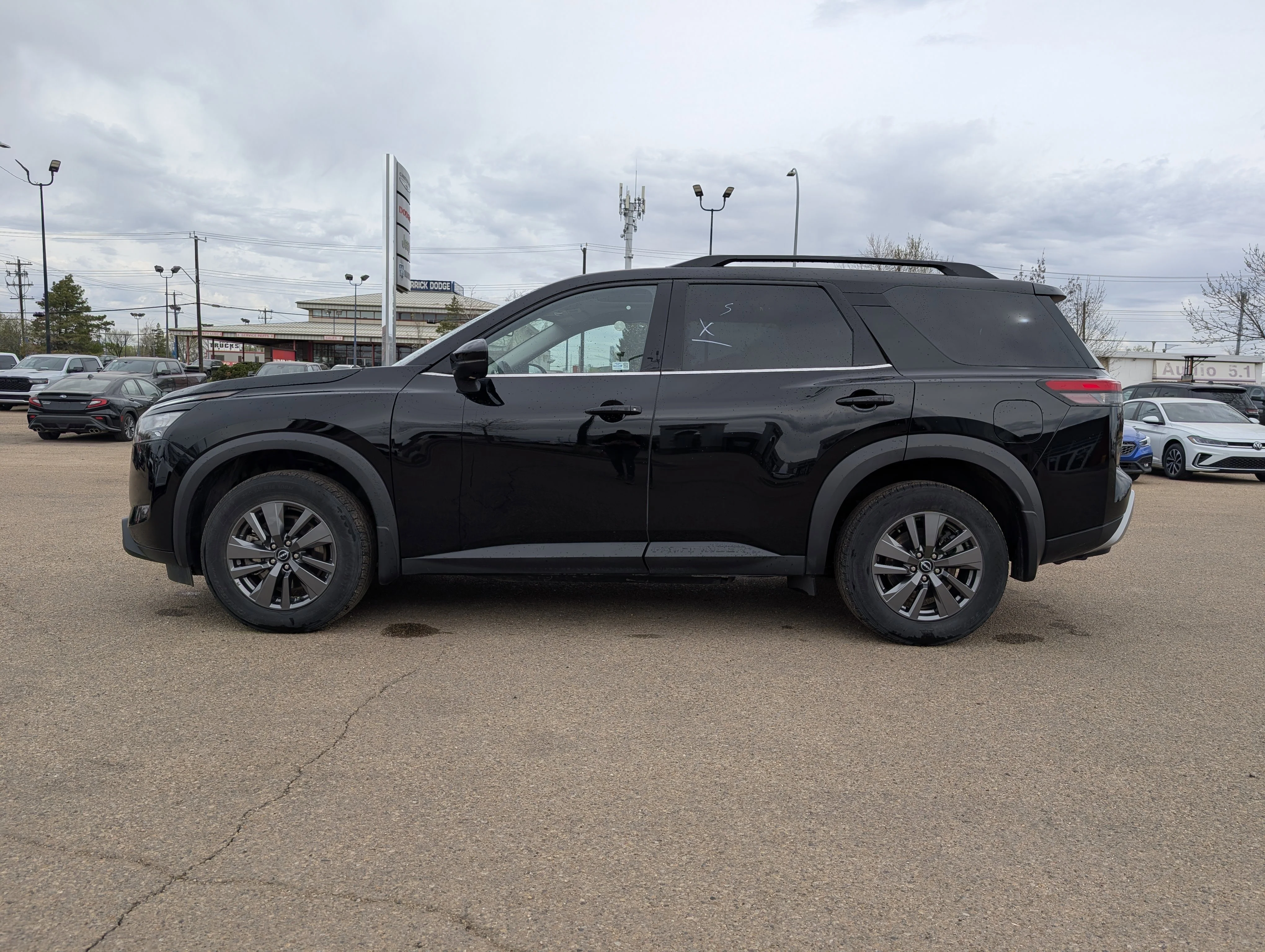 Used 2024 Gun Metallic Nissan SV image 3