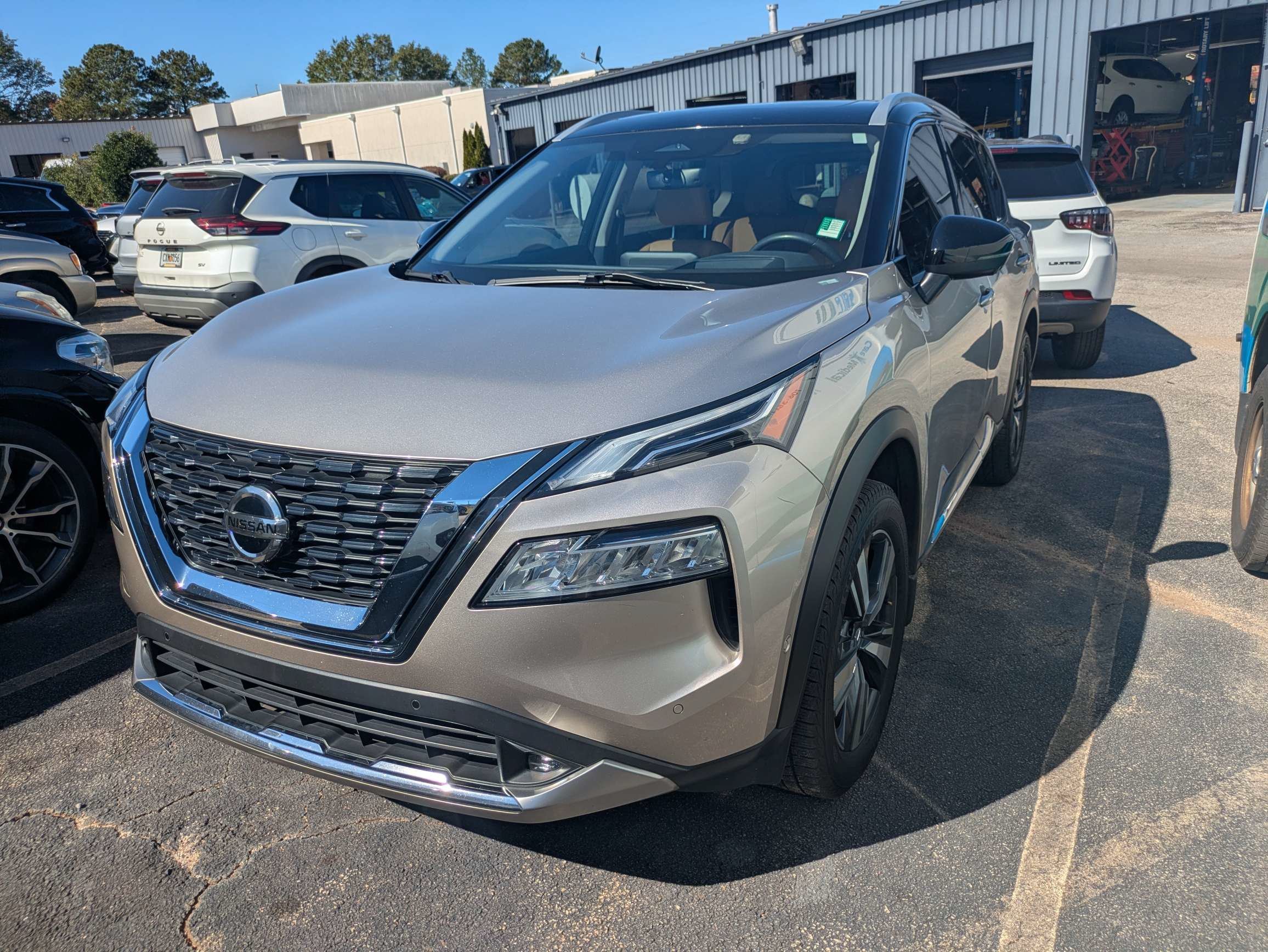 Used 2021 Gold Nissan Platinum image 2