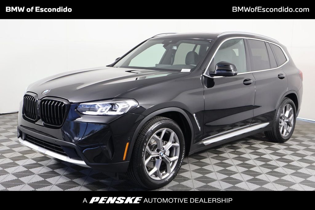 Used 2023 Black BMW sDrive30i image 1