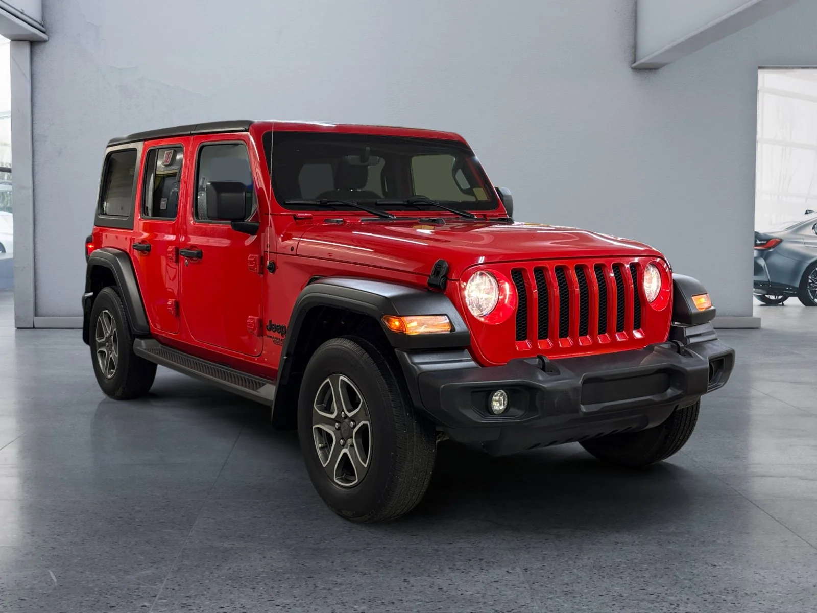 Used 2021 Firecracker Red C/C Jeep Unlimited Sport image 7