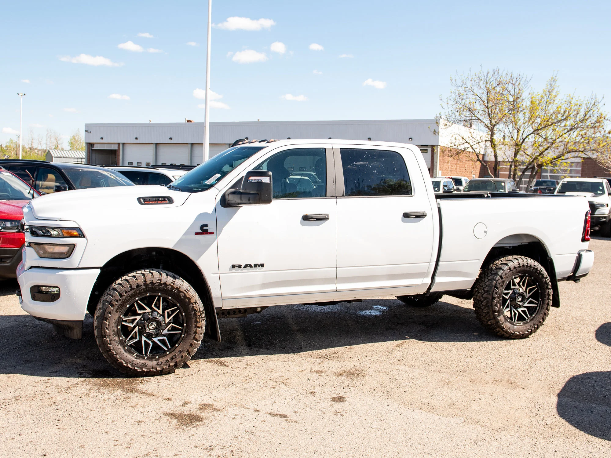 New 2026 White RAM Big Horn*, 35 Inch Tires, 20 Inch Toyos image 3