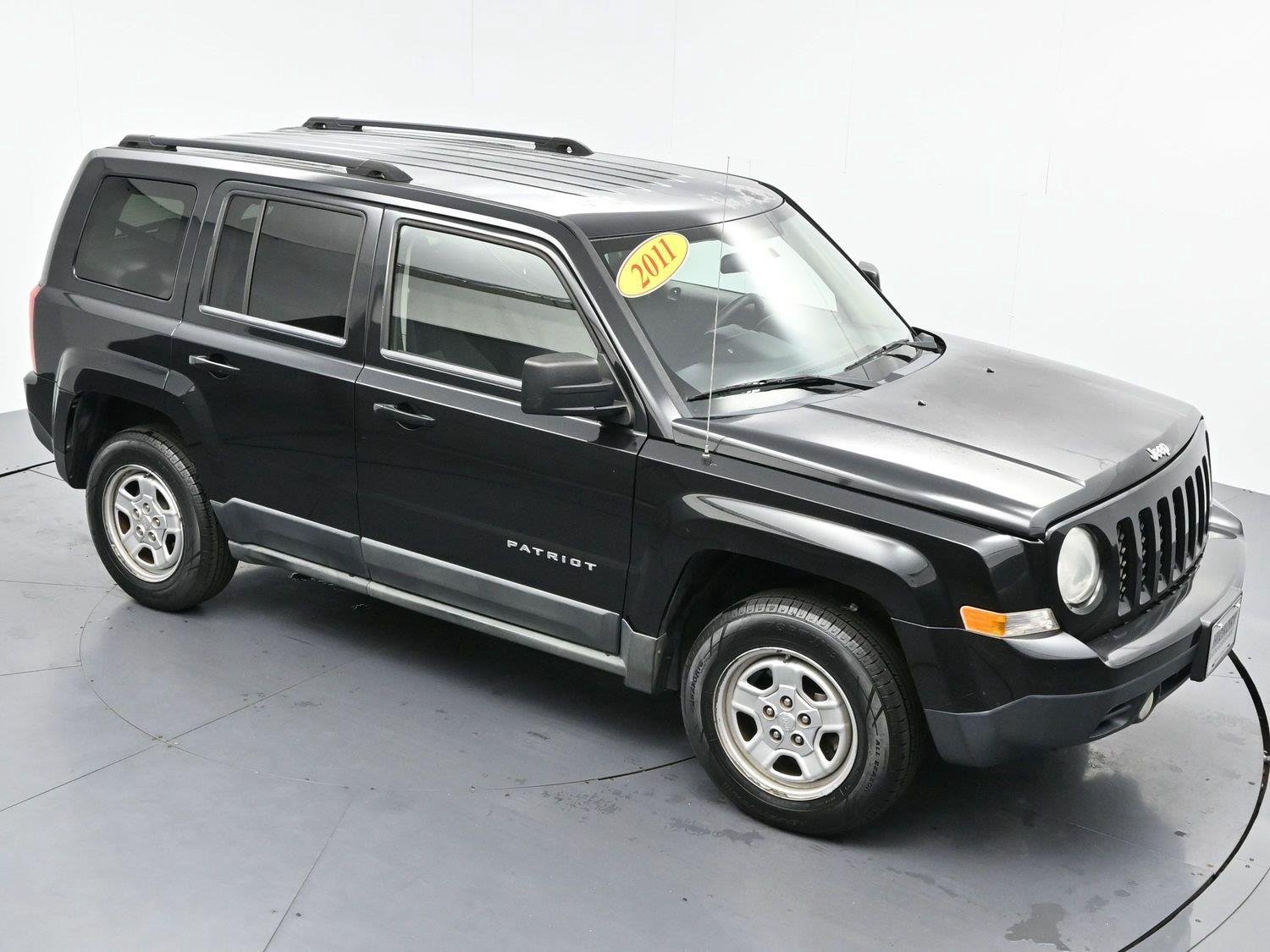 Used 2011 Brilliant Black Crystal Pearl Jeep Sport image 29