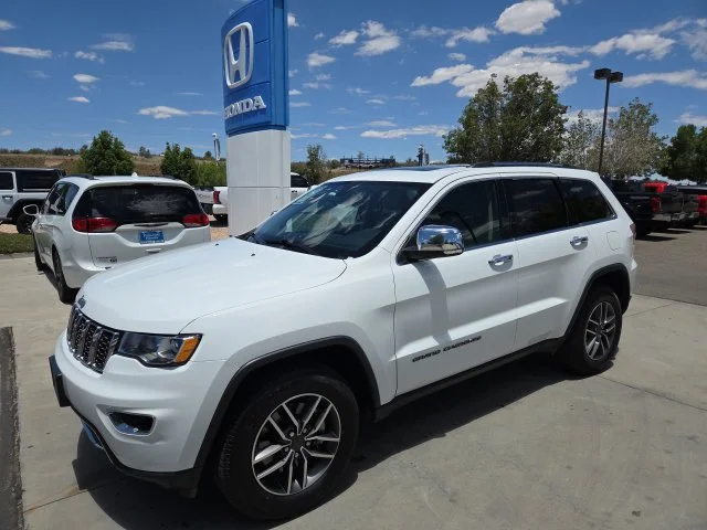 Used 2021 Bright White Clearcoat Jeep Limited image 1