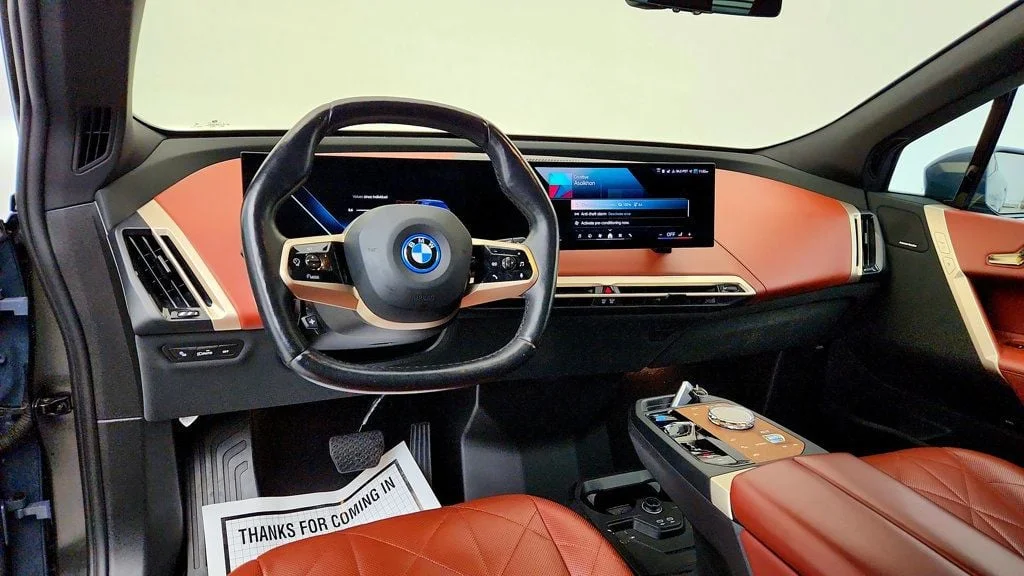 Used 2025 Storm Bay Metallic BMW xDrive50 SAV w/ Premium, Sport, Luxury Pkgs & Air Suspension image 12
