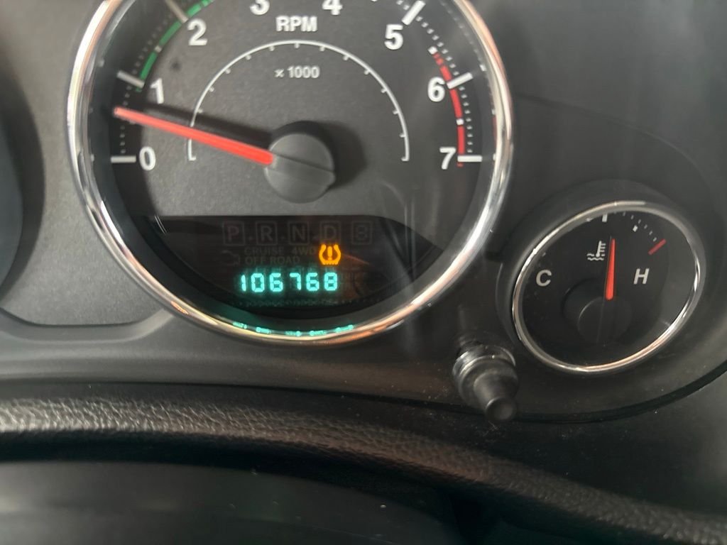 Used 2011 Red Jeep Unlimited Sport image 19