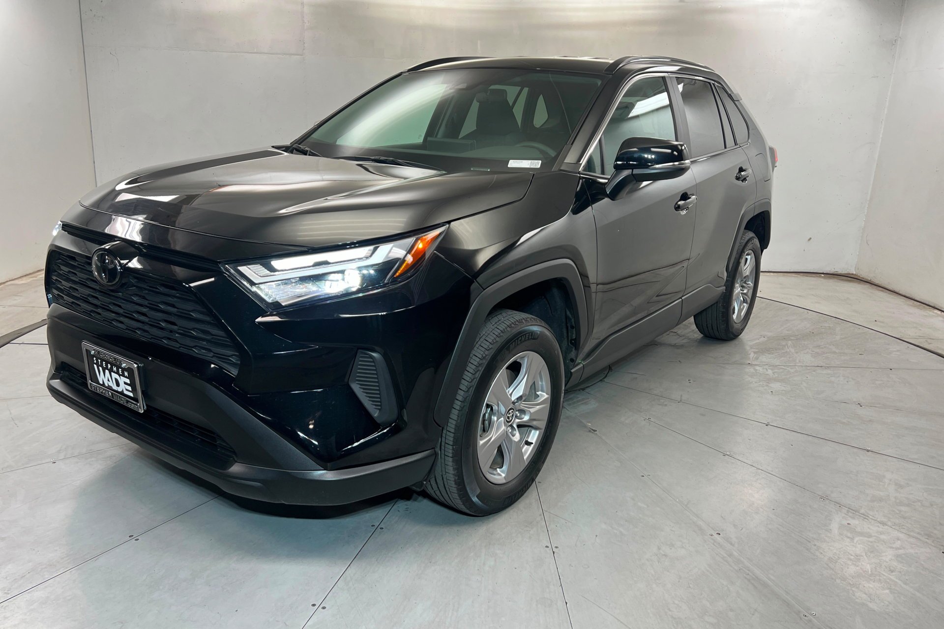 Used 2025 Midnight Black Metallic Toyota XLE image 1