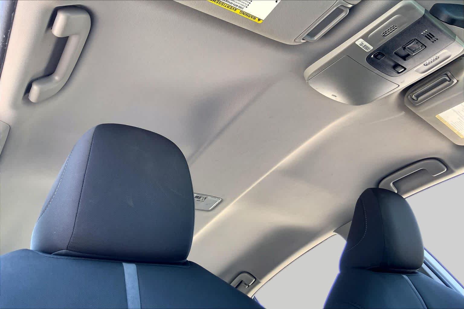 Used 2021 Super White Toyota LE image 14