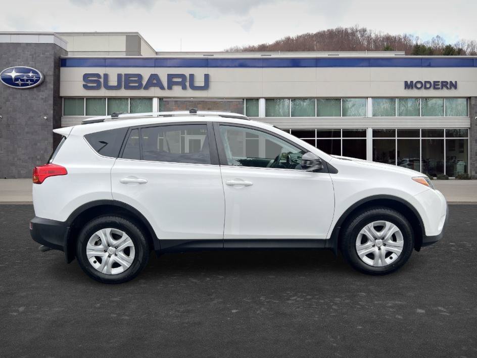 Used 2015 Super White Toyota LE image 4