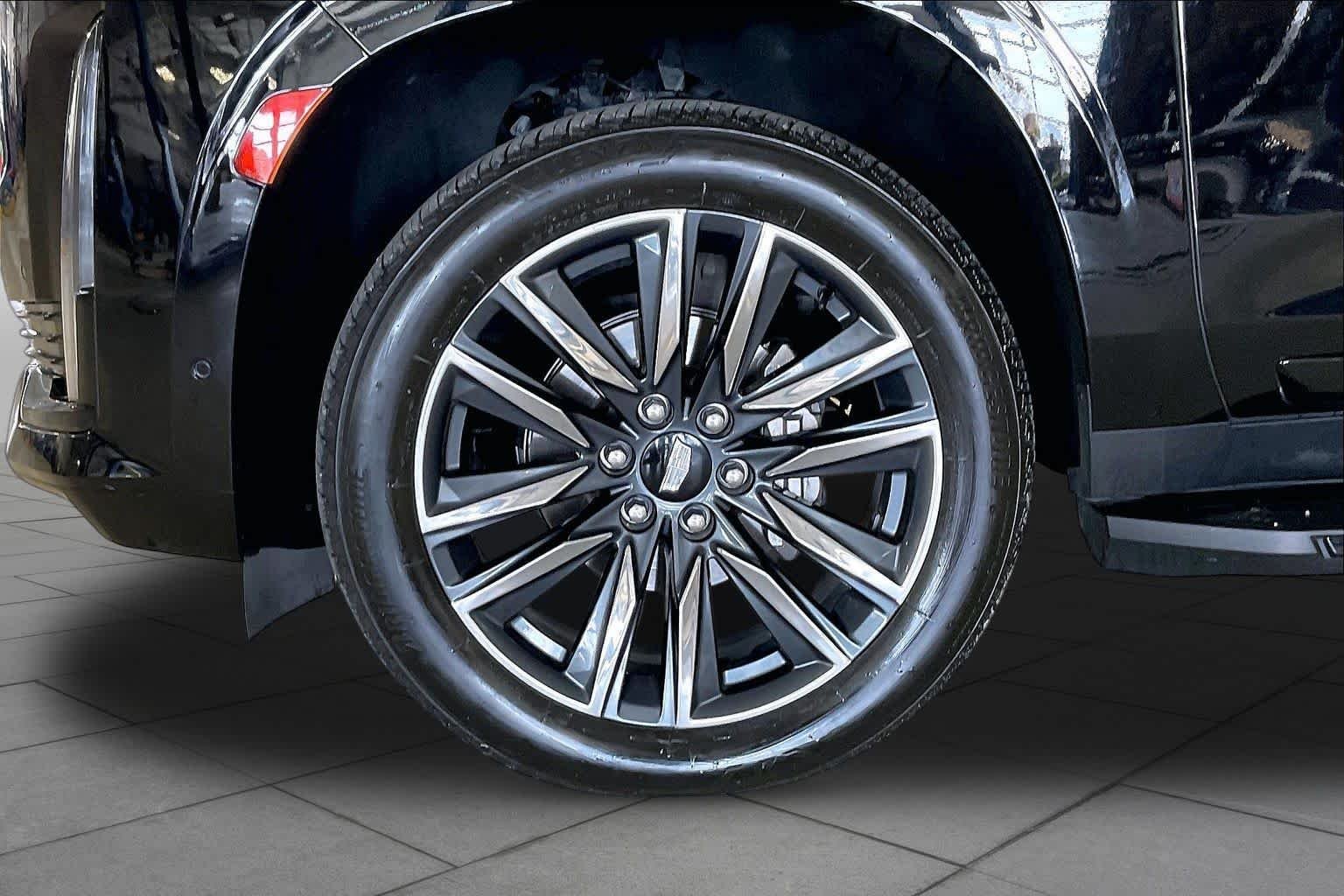 Used 2023 Black Raven Cadillac 4WD Sport image 10