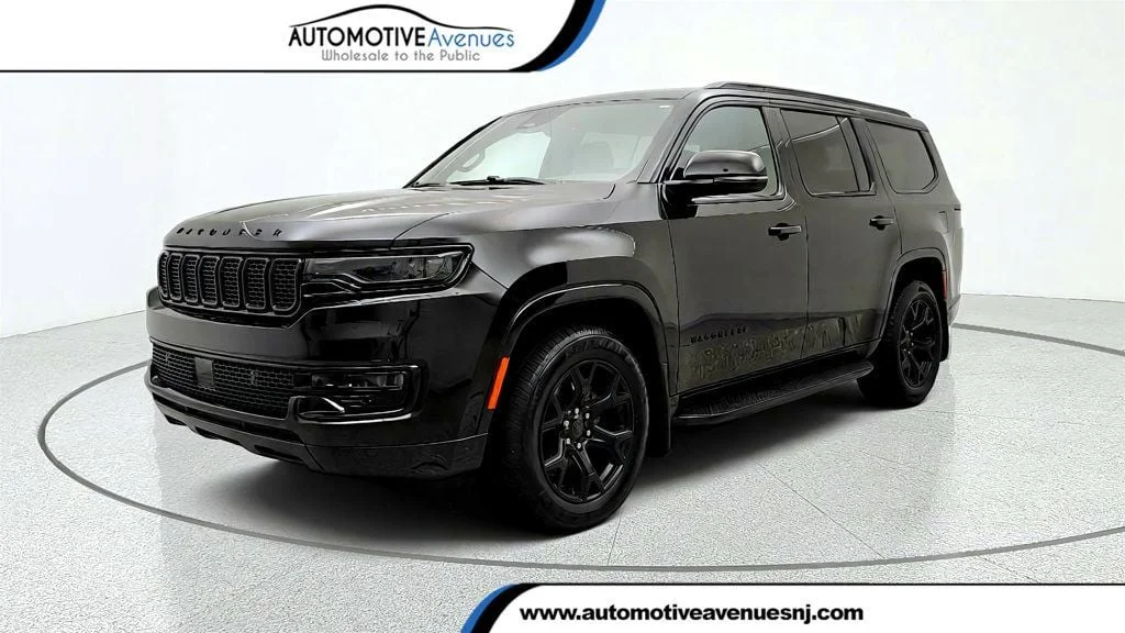 Used 2025 Diamond Black Crystal Pearlcoat Jeep Series II Carbide 4x4 w/ Rear Entertainment & 20