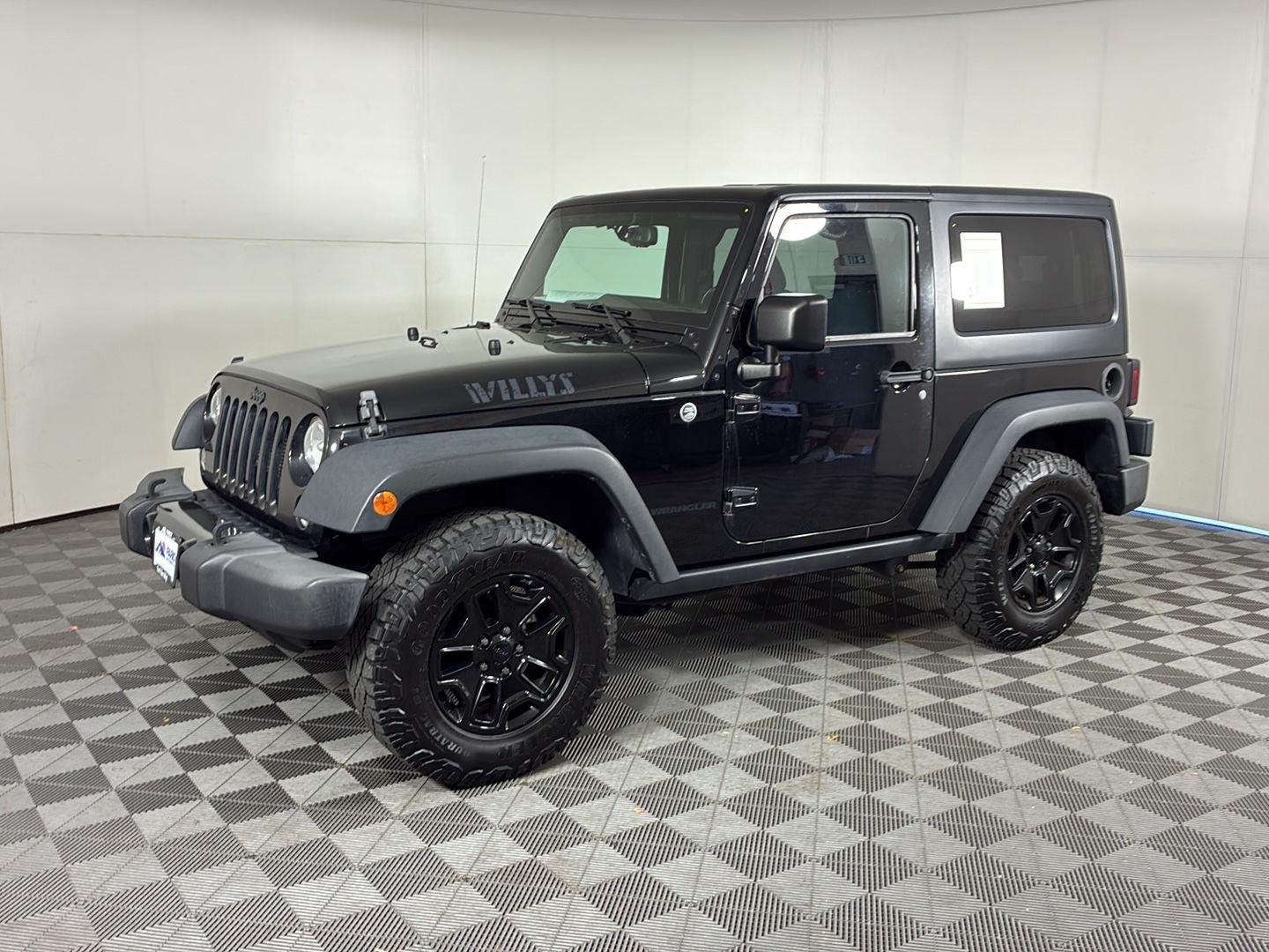 Used 2015 Black Clearcoat Jeep Willys Wheeler image 1