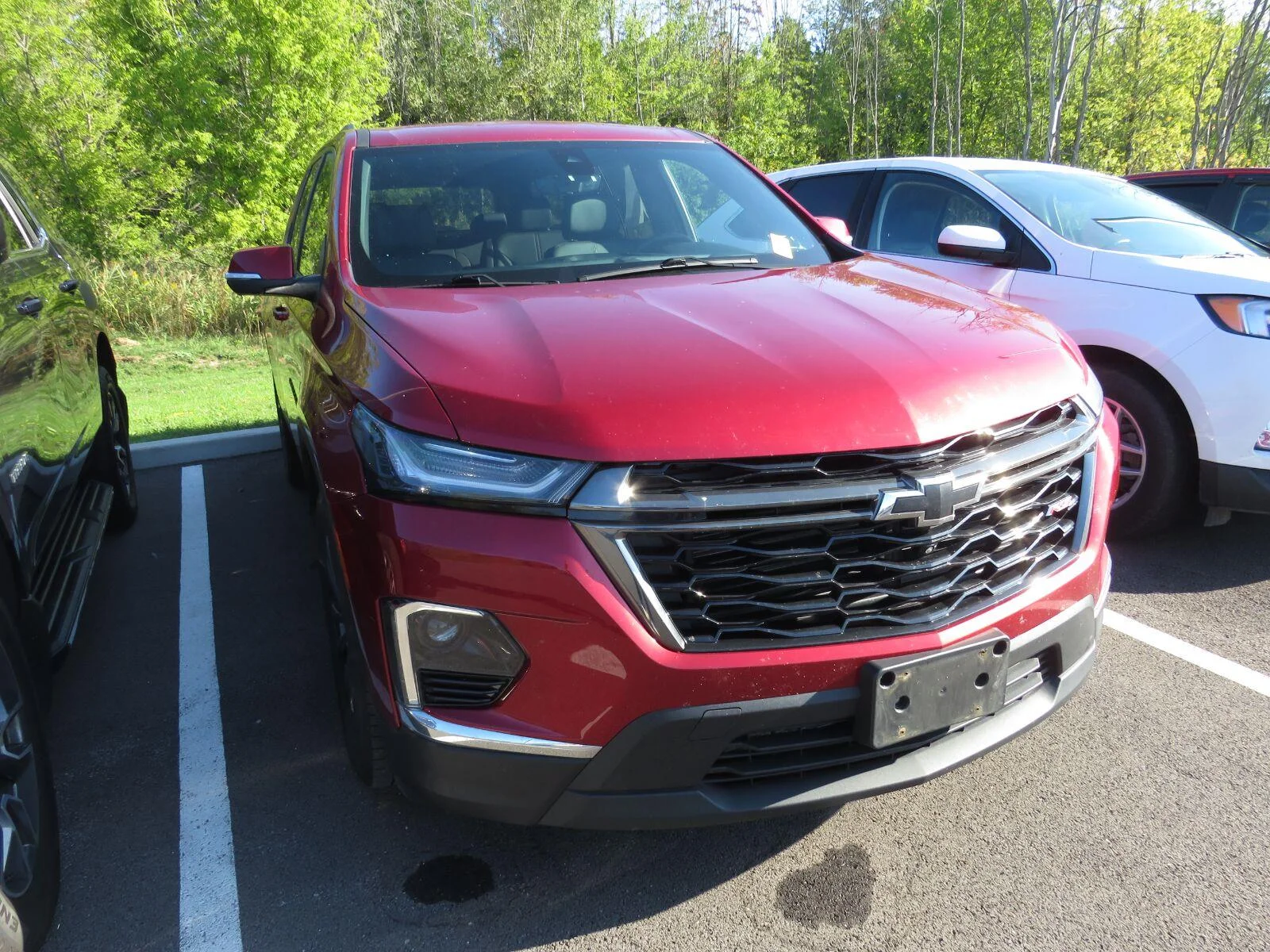 Used 2023 RADIANT RED TINTCOAT Chevrolet RS image 2