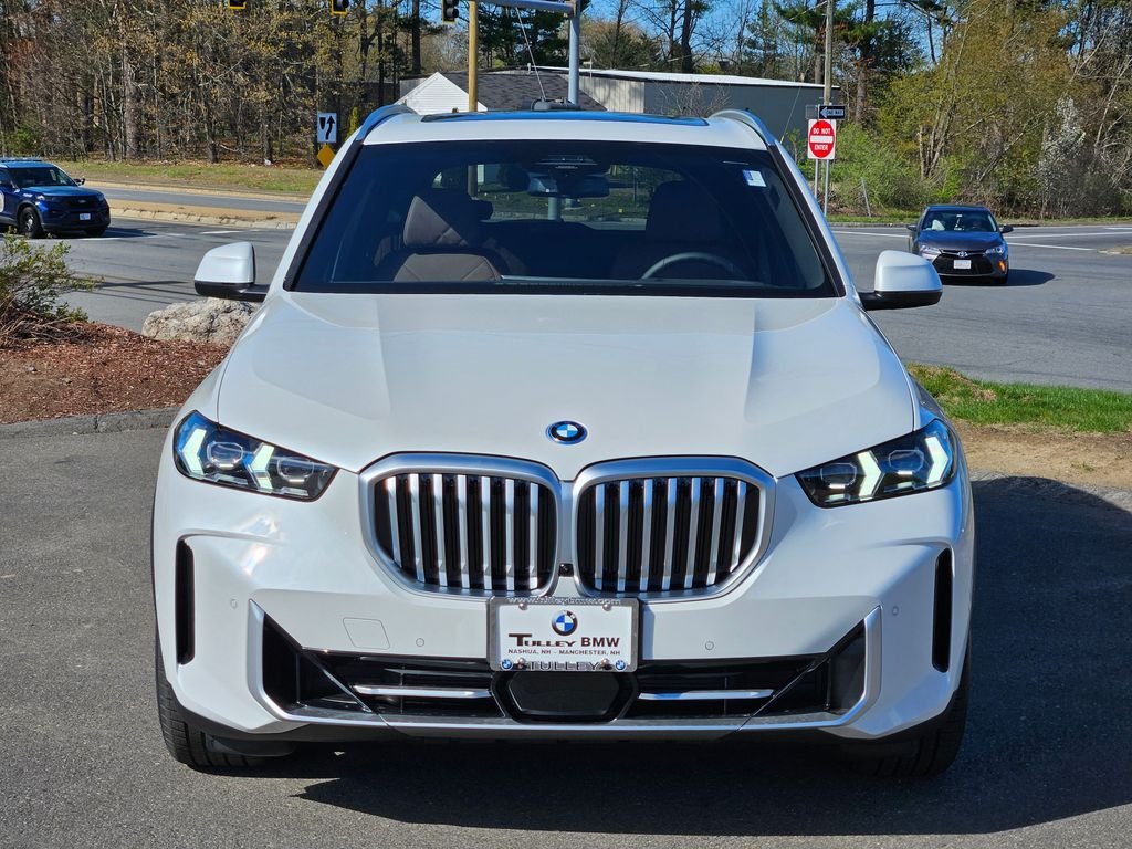 New 2026 Mineral White Metallic BMW xDrive50e image 2
