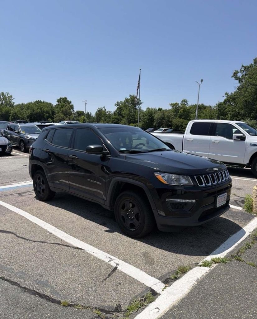 Used 2021 Black Jeep Sport image 1