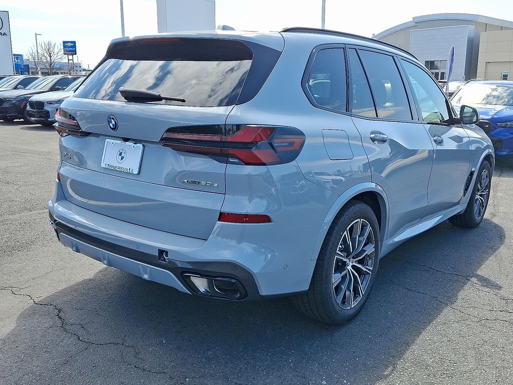 Used 2026 Brooklyn Grey Metallic BMW xDrive50e image 4