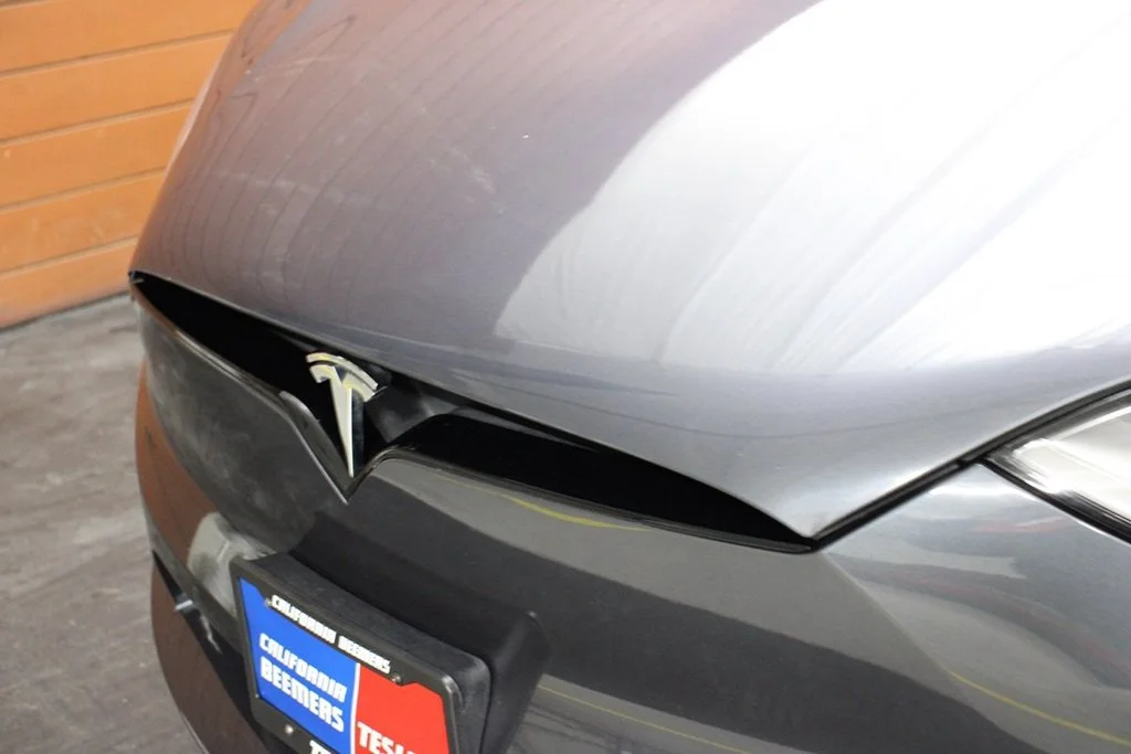 Used 2022 Solid Black Tesla Plaid image 5