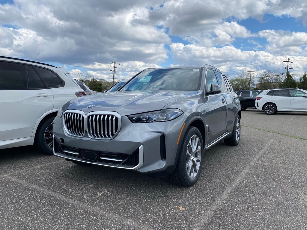 New 2026 Skyscraper Grey Metallic BMW xDrive40i image 1
