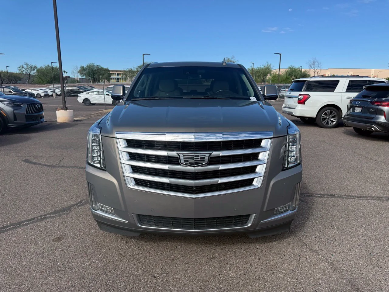 Used 2017 Bronze Dune Cadillac Luxury image 1