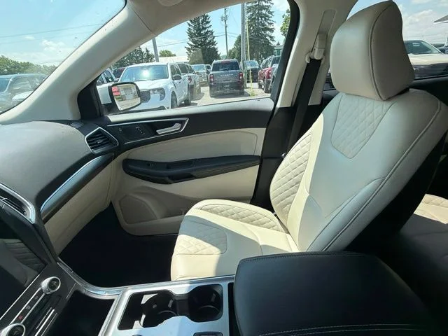 Used 2023 White Metallic Ford Titanium image 30