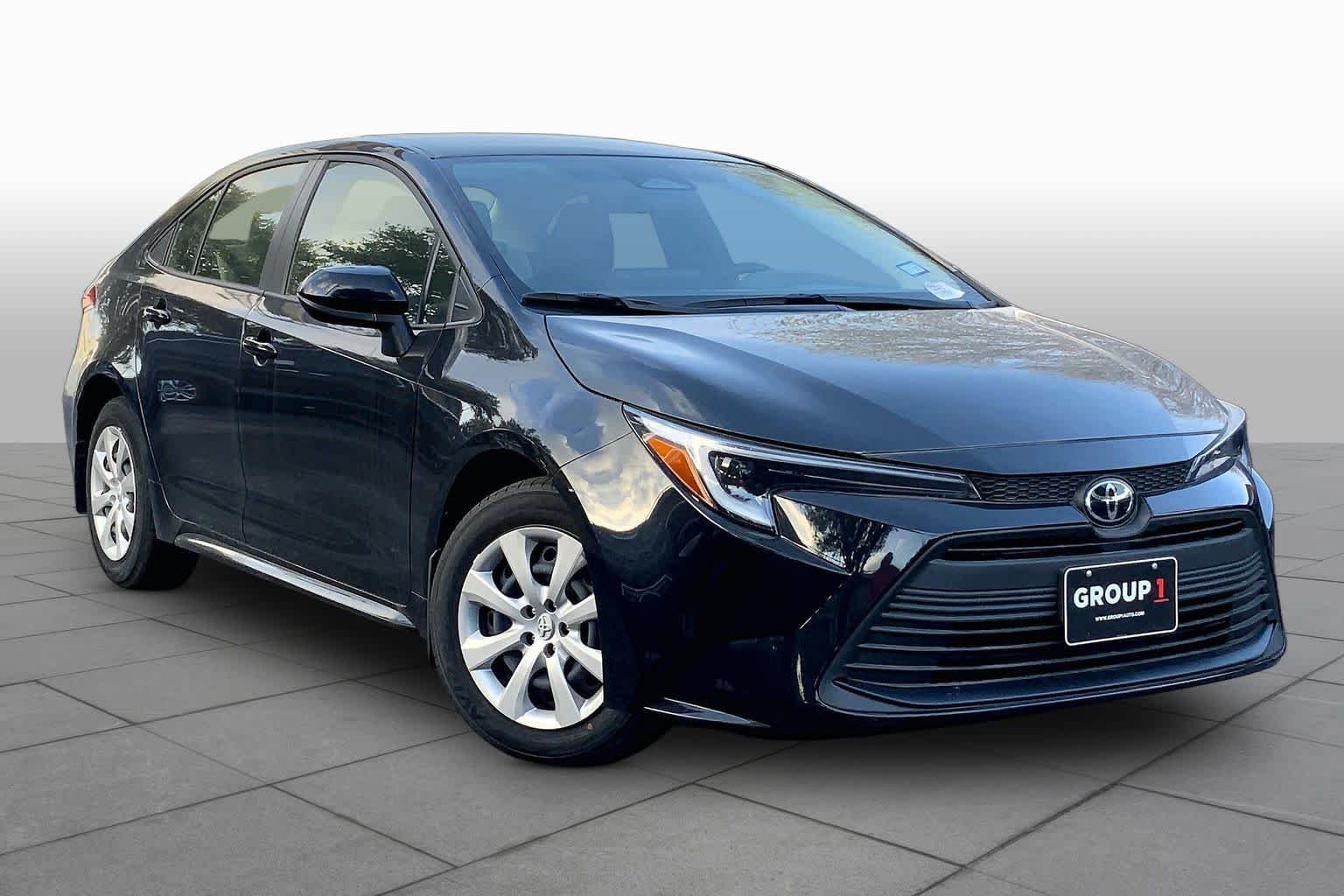 Used 2026 Midnight Black Metallic Toyota Hybrid LE image 3
