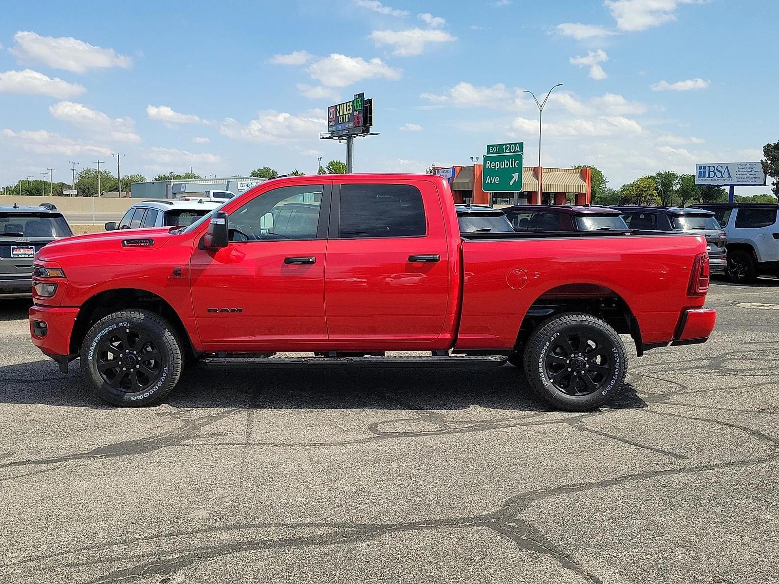 New 2026 Flame Red Ram LONE STAR CREW CAB 4X4 6