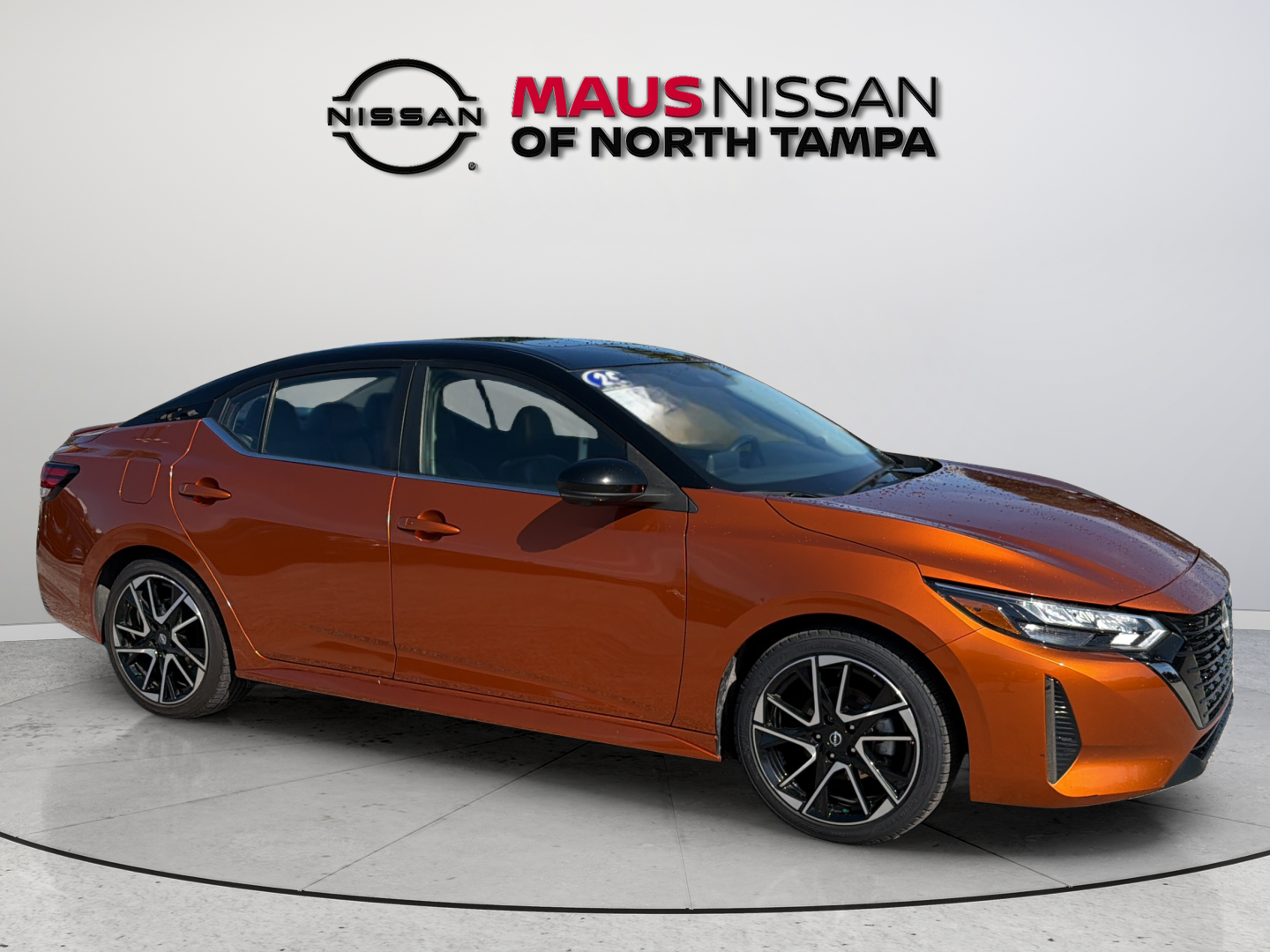 Certified Used 2025 Orange Nissan SR image 1
