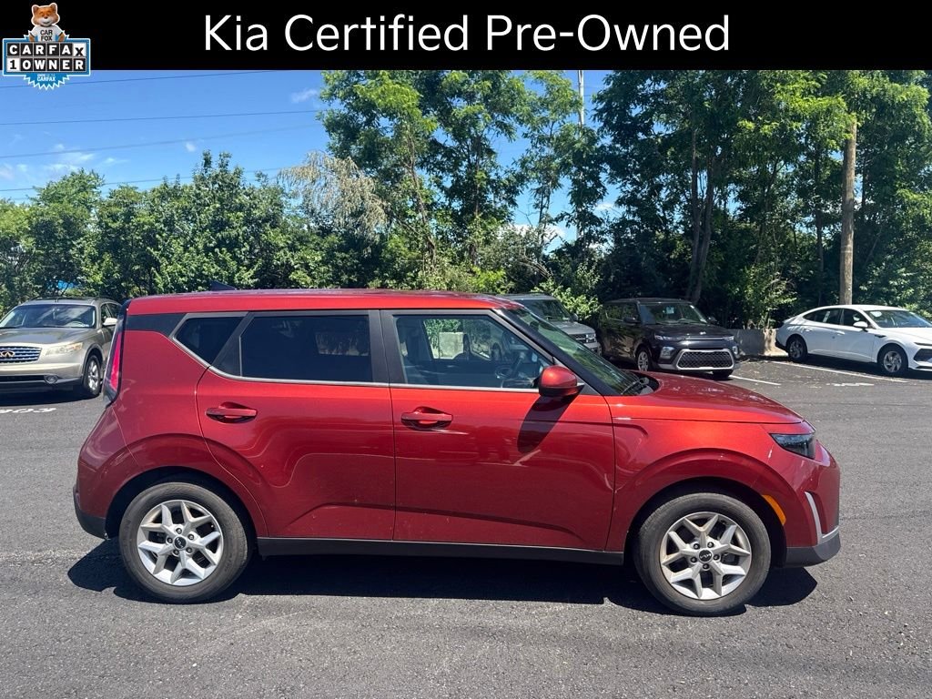 Certified Used 2023 Orange Kia LX image 1