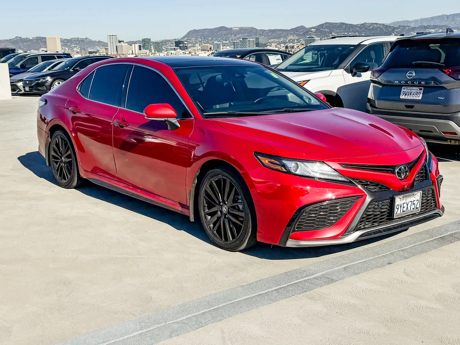 Used 2024 Supersonic Red Toyota XSE V6 image 3