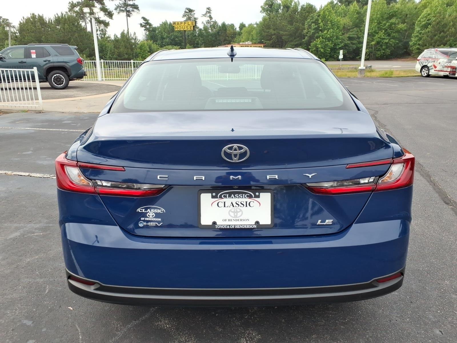 Used 2025 Reservoir Blue Toyota LE image 10