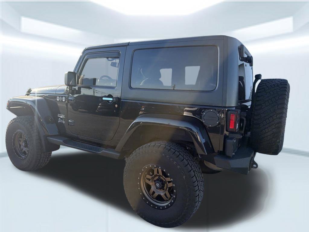 Used 2015 Black Clearcoat Jeep Sahara image 16