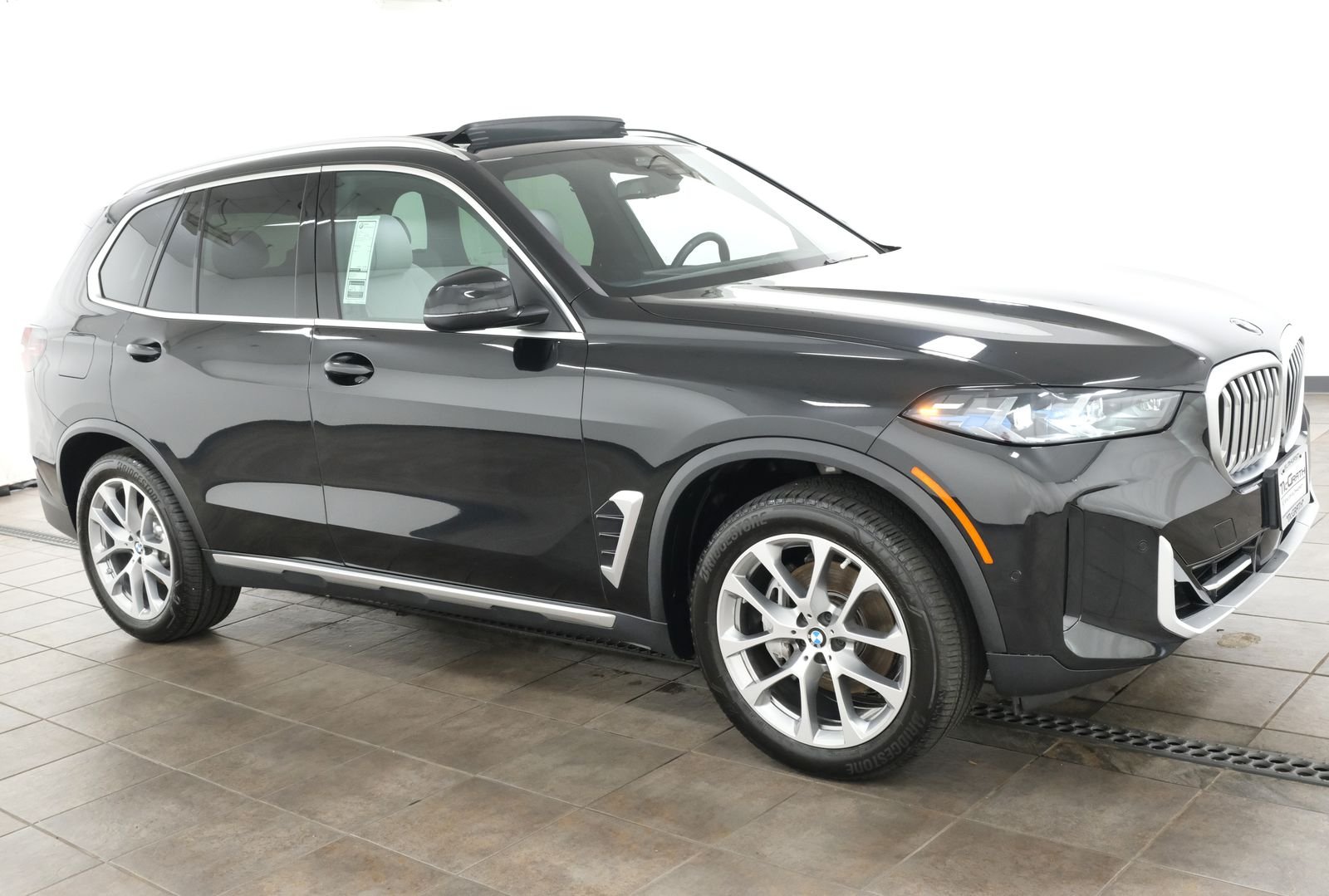 Certified Used 2024 Black Sapphire Metallic BMW xDrive40i image 6