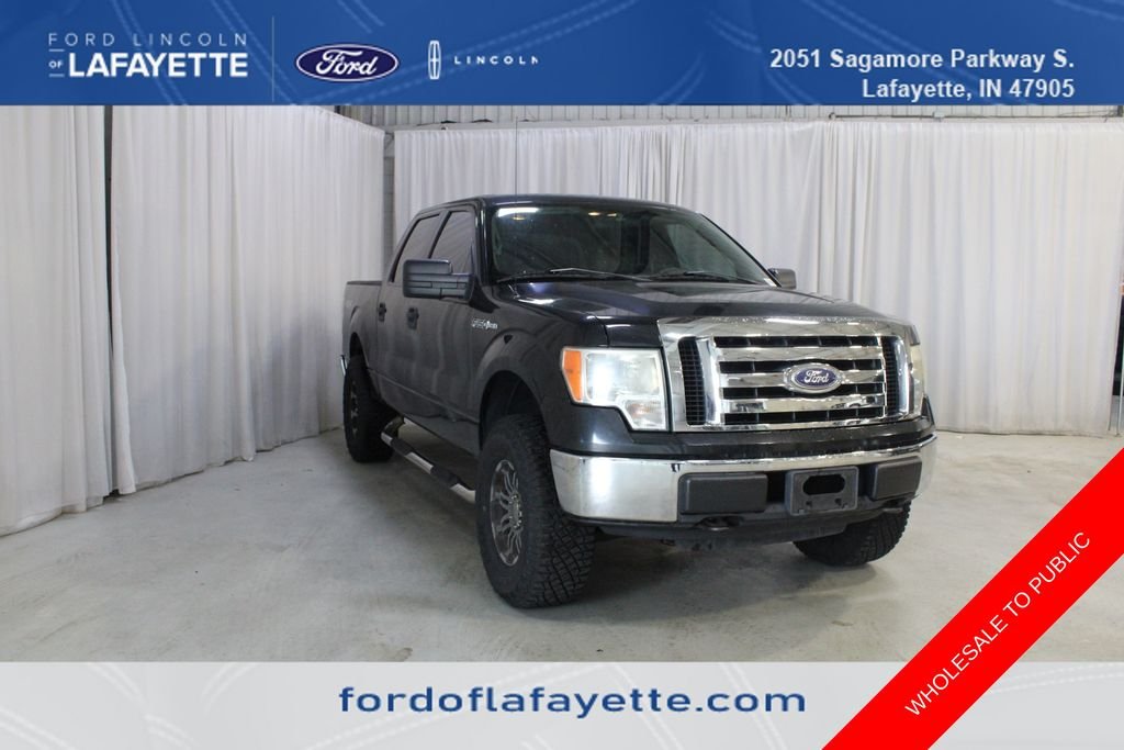 Used 2010 Black Ford XLT image 1