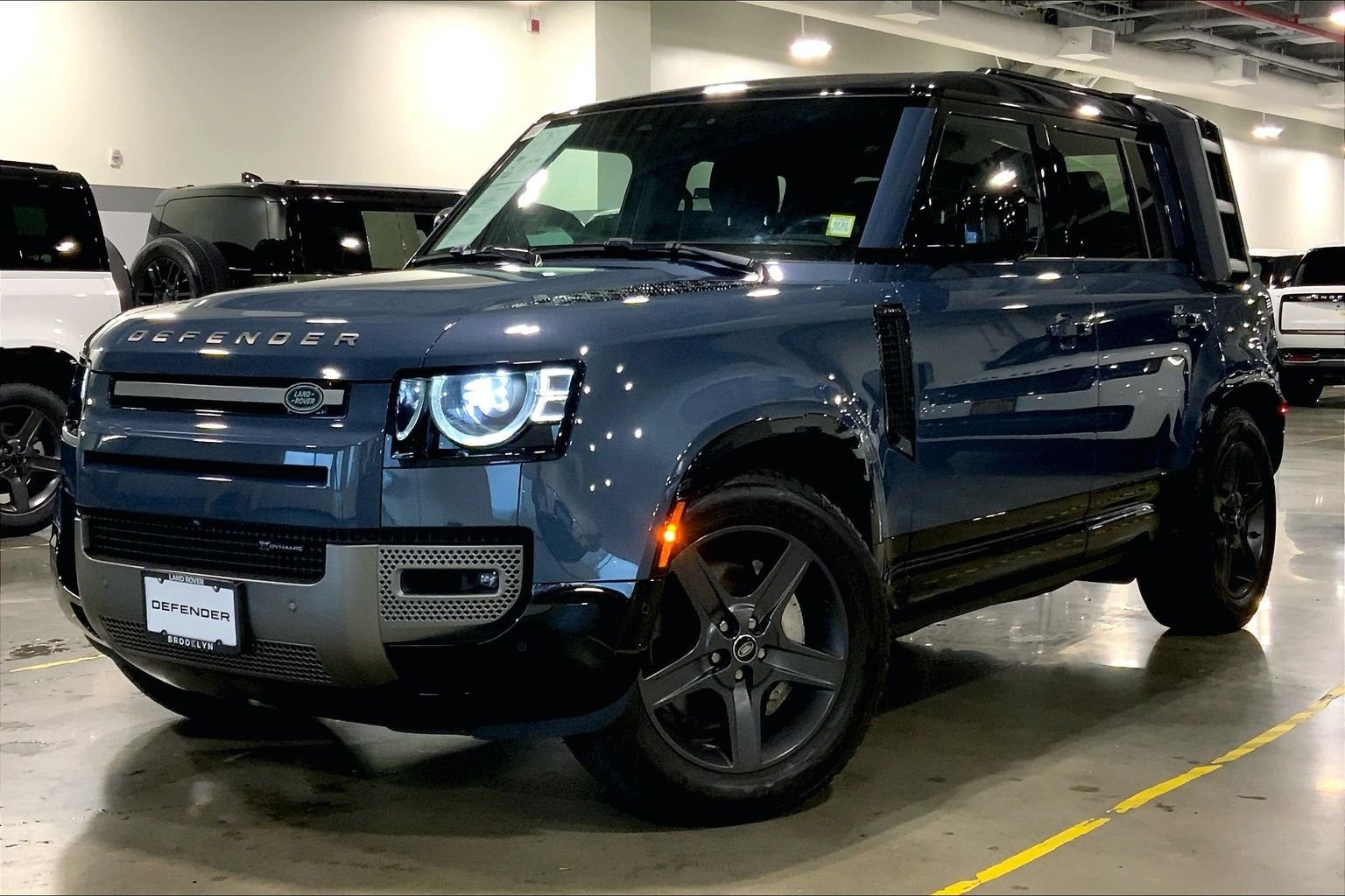 Used 2023 Tasman Blue Metallic Land Rover X-Dynamic SE image 1