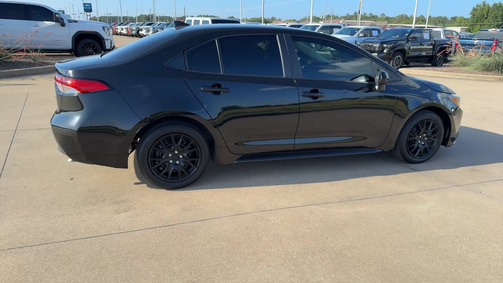 Used 2024 Midnight Black Metallic Toyota LE image 9