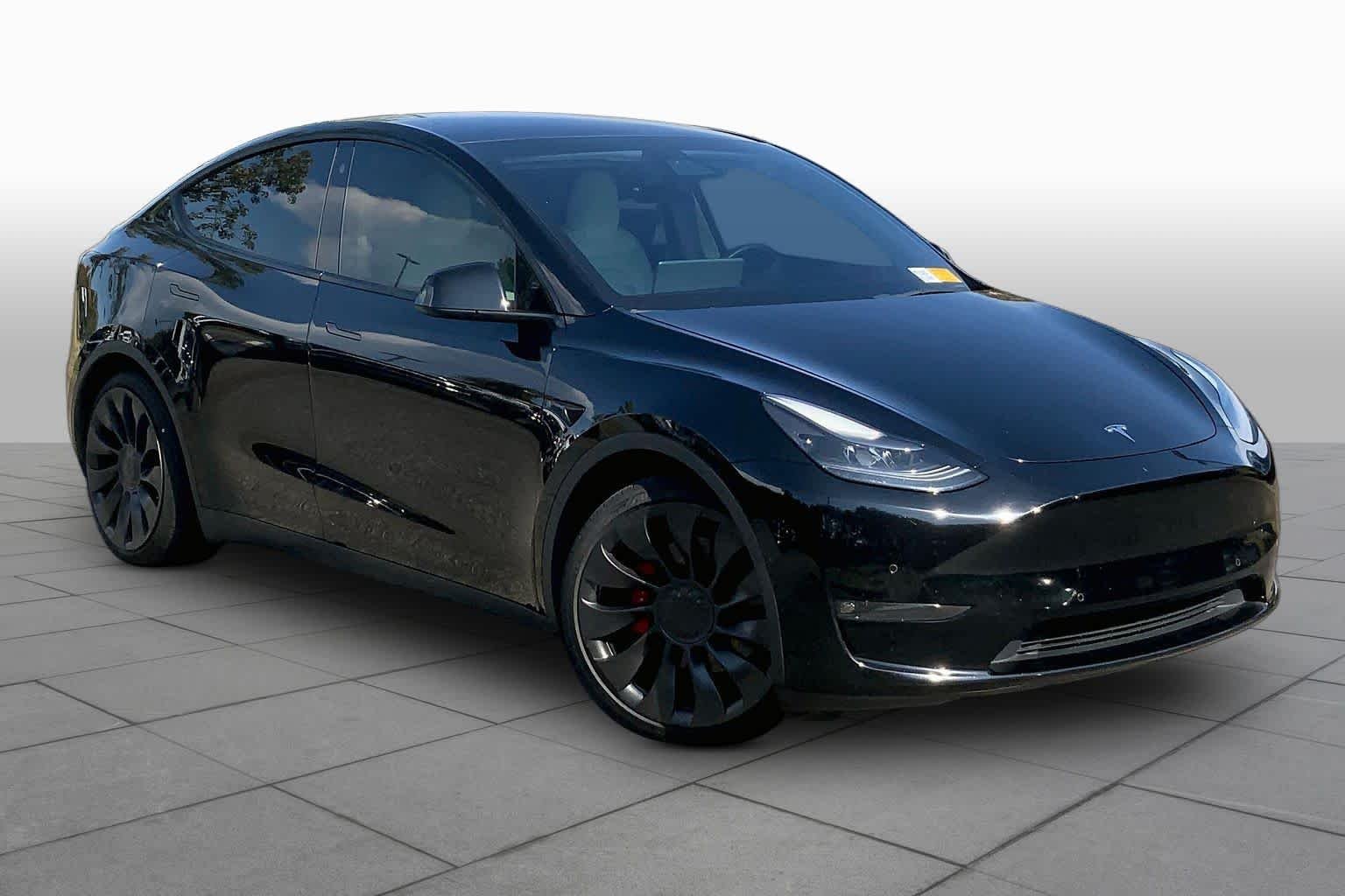 Used 2021 Solid Black Tesla Performance image 2