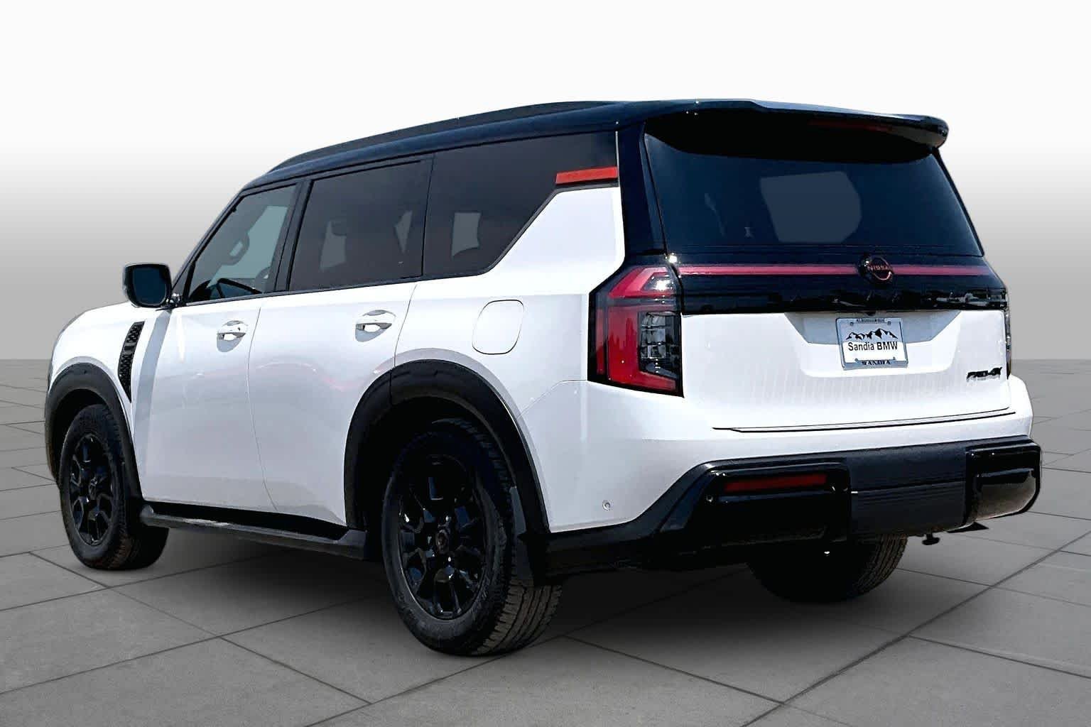 Used 2025 Aspen White Tricoat/Super Black Nissan PRO-4X image 9