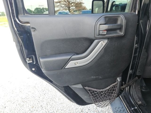 Used 2013 Black Jeep Unlimited Sahara image 13