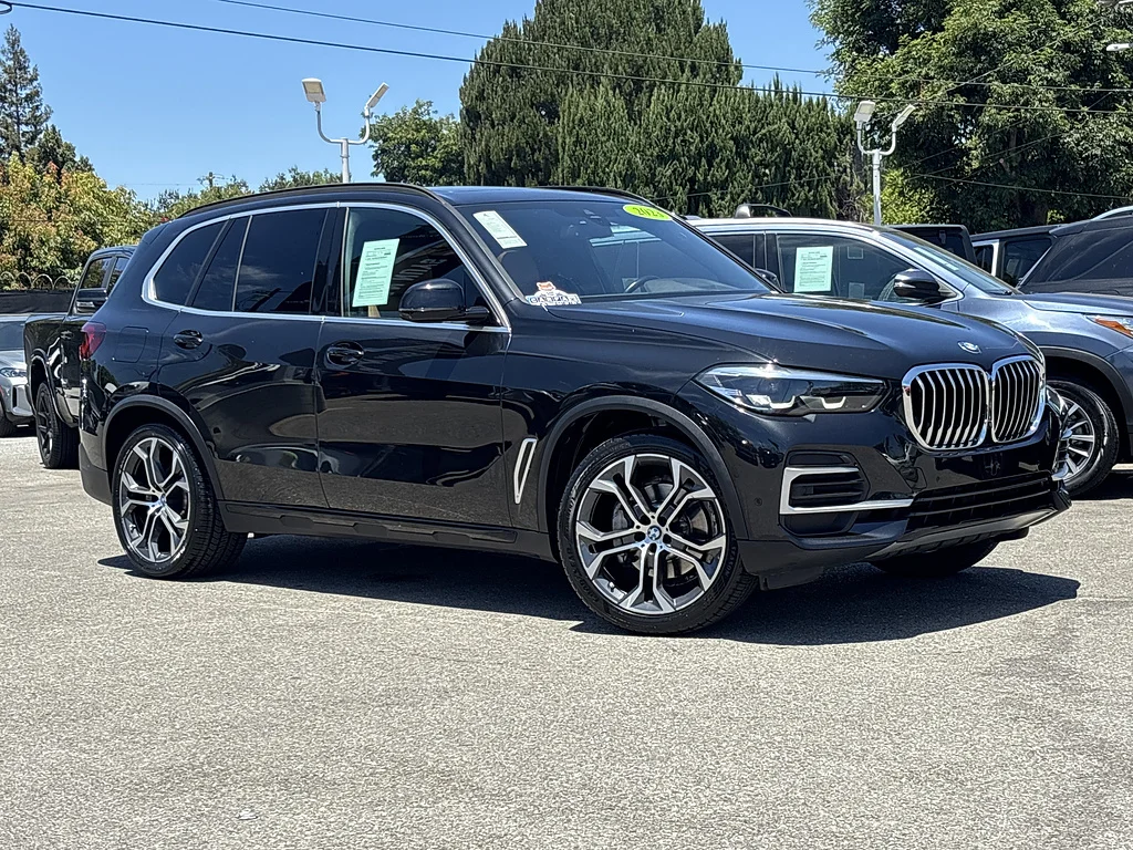 Used 2023 Black Sapphire Metallic BMW xDrive40i image 1