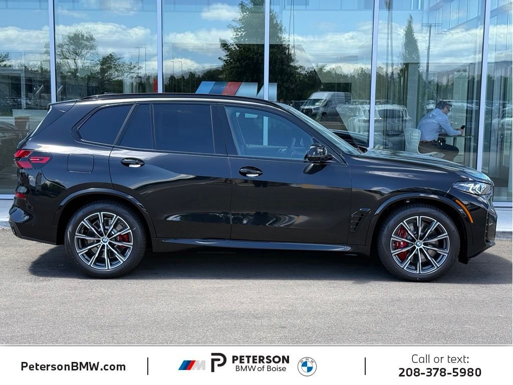 New 2026 Black Sapphire Metallic BMW xDrive50e image 6