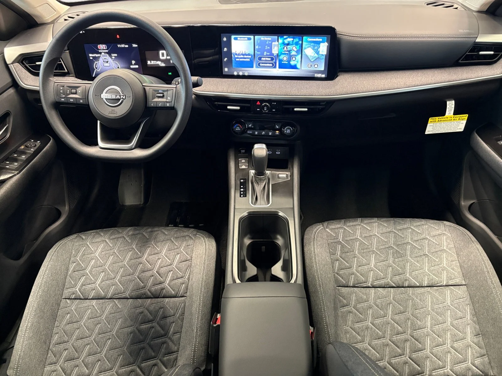 New 2026 Gun Metallic Nissan SV image 2