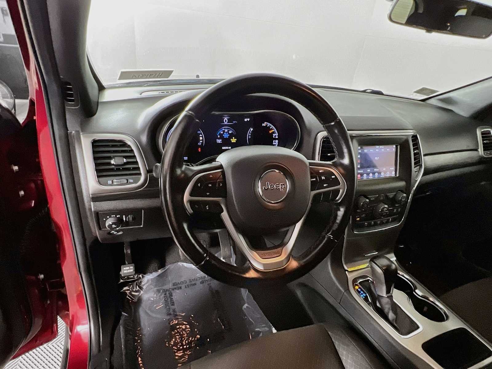 Used 2021 Velvet Red Pearlcoat Jeep Laredo E image 11