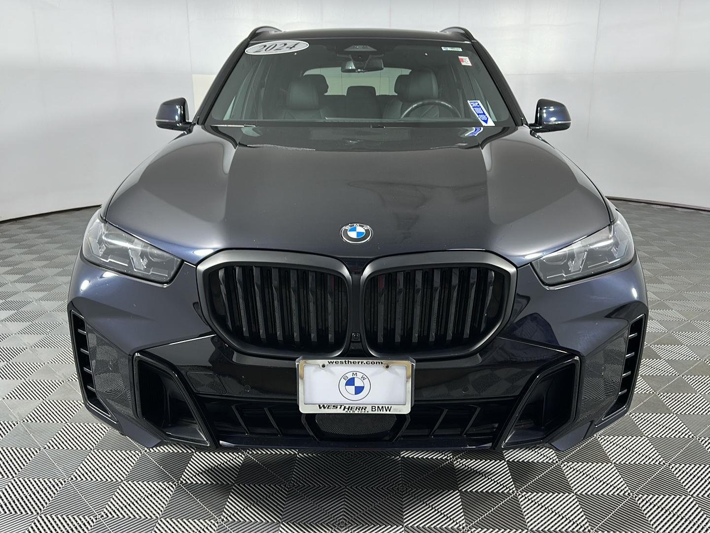 Certified Used 2024 Carbon Black Metallic BMW xDrive40i image 4