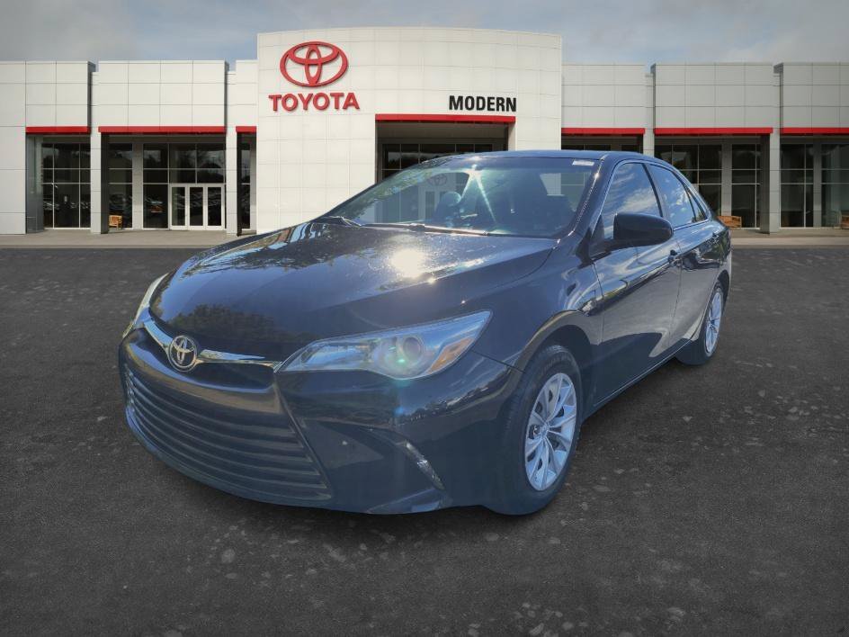 Used 2017 Midnight Black Metallic Toyota LE image 1