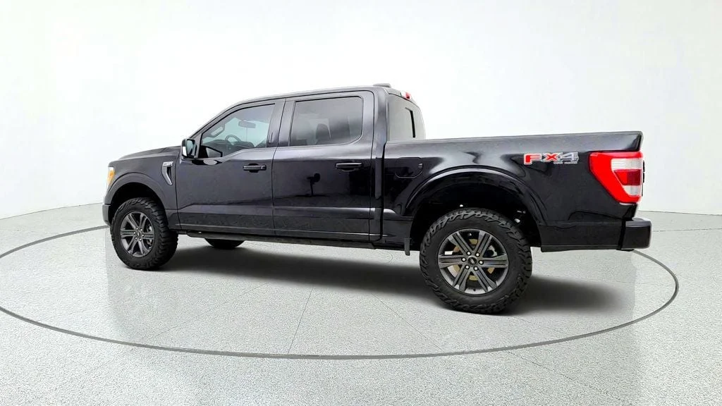 Used 2023 Agate Black Metallic Ford LARIAT 4WD SuperCrew 5.5