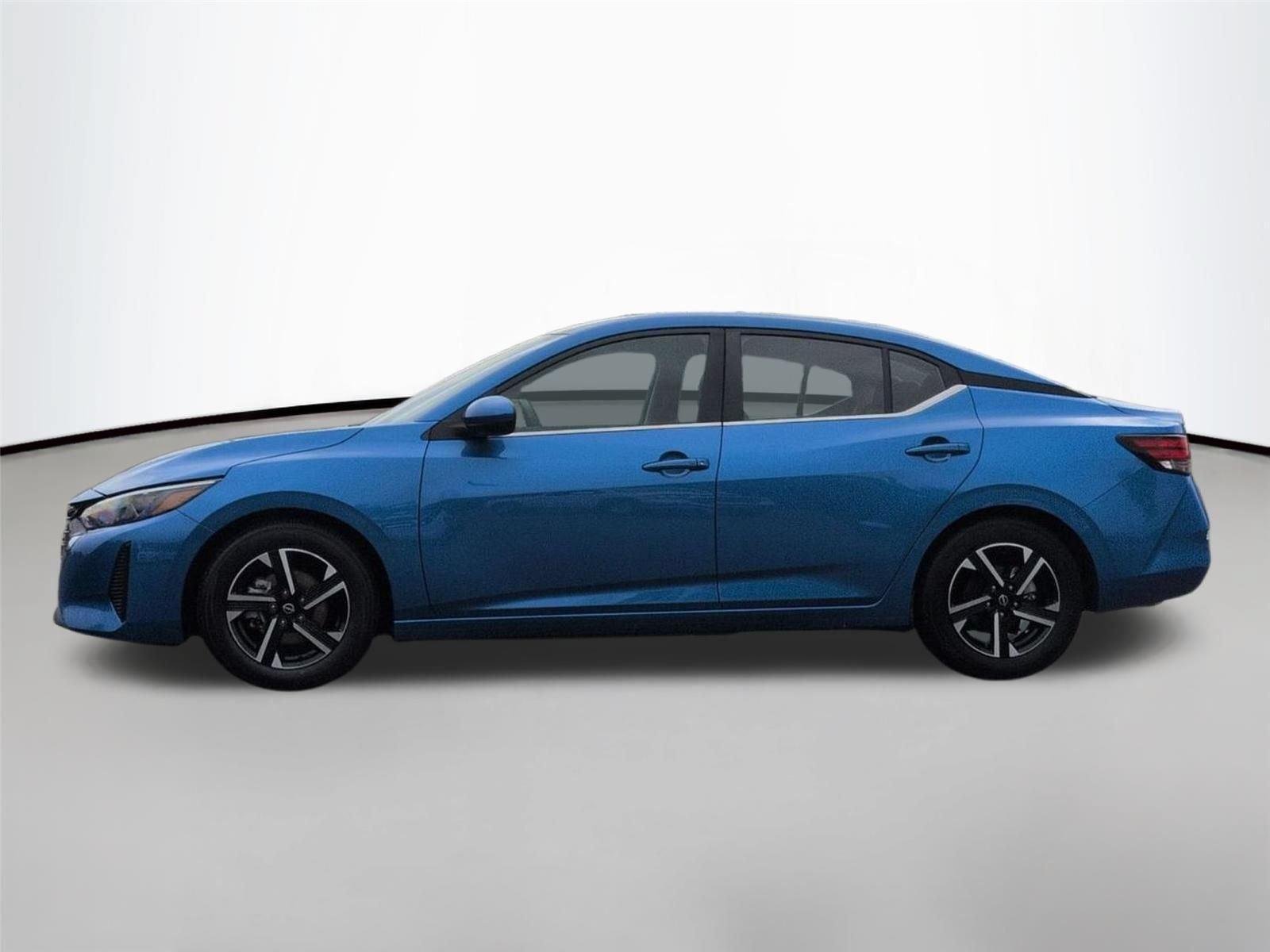 Used 2024 Electric Blue Metallic Nissan SV image 1