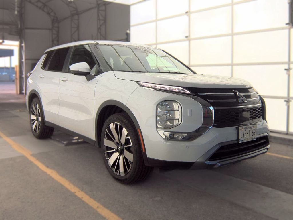 Used 2025 White Mitsubishi Trail Edition image 1
