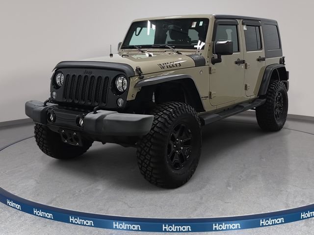 Used 2018 Gobi Clearcoat Jeep Unlimited Willys Wheeler image 1