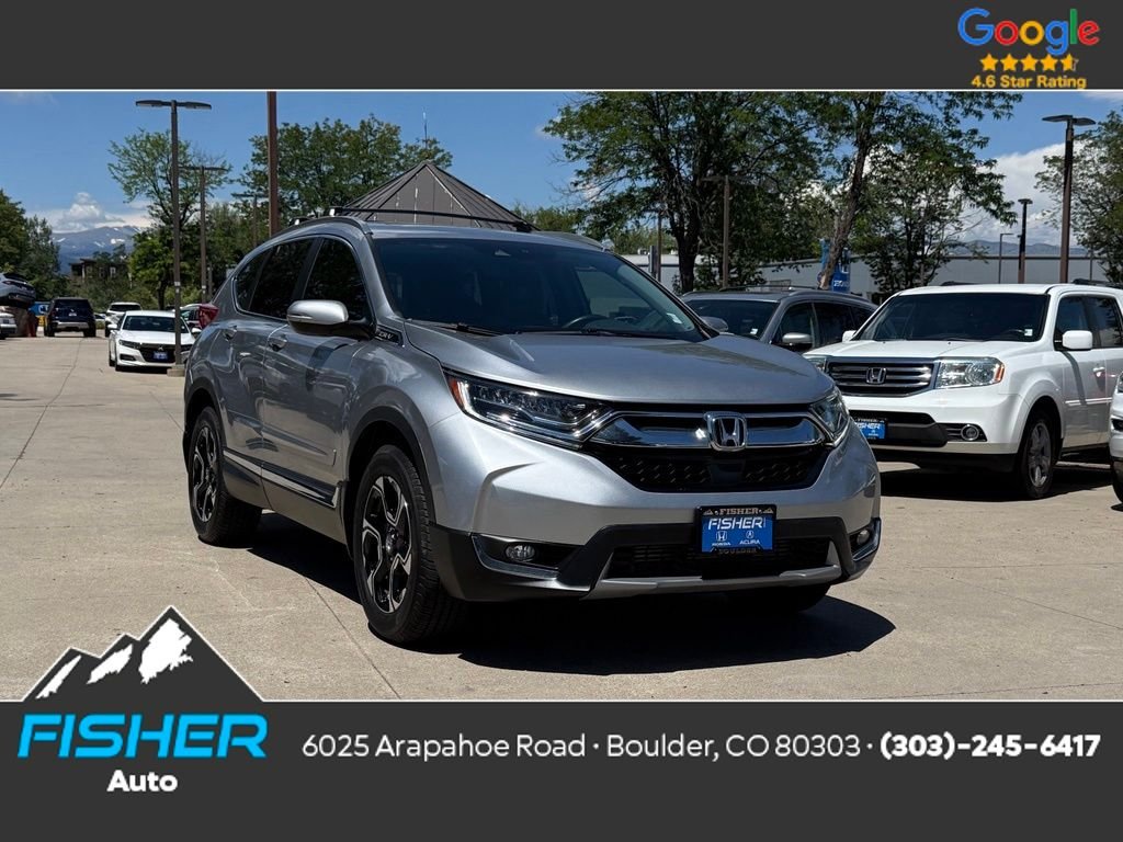 Used 2018 Lunar Silver Metallic Honda Touring image 1