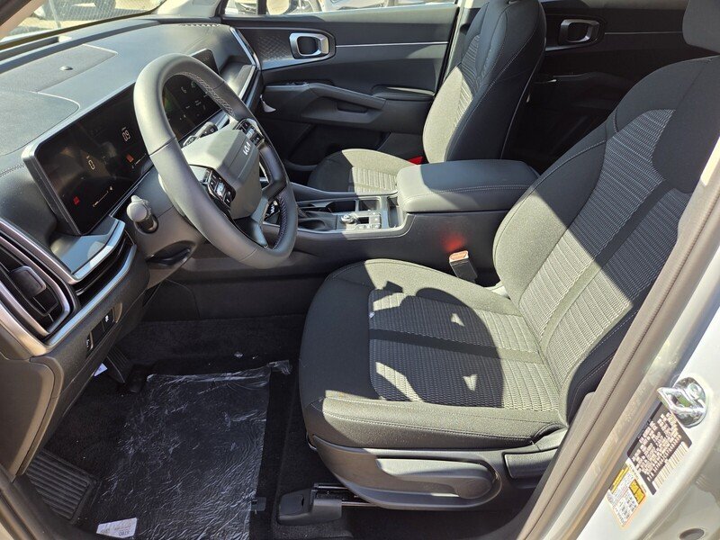 New 2026 Ivory Silver Kia LX image 6